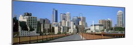 Stone Arch Bridge with Skyscrapers in the Background, Minneapolis, Minnesota, USA-null-Mounted Photographic Print