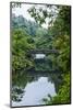 Stone Bridge with Flowers in Seogwipo, Island of Jejudo, South Korea-Michael Runkel-Mounted Photographic Print