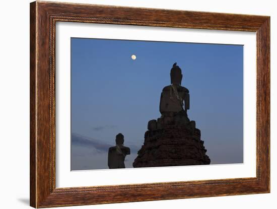 Stone Buddhas With Common Myna (Acridotheres Tristis) On Top And Moon. Thailand-Oscar Dominguez-Framed Photographic Print