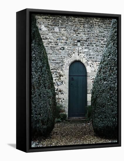 Stone Entry and Wood Door Flanked by Manicured Bushes-Tim Kahane-Framed Premier Image Canvas