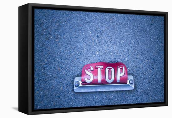 Stop Sign On Asphalt-Justin Bailie-Framed Premier Image Canvas