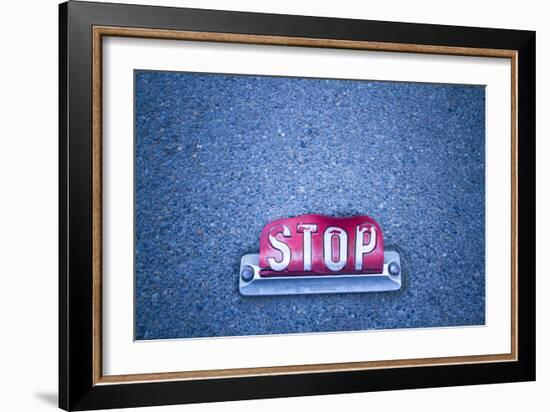 Stop Sign On Asphalt-Justin Bailie-Framed Photographic Print