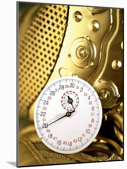Stopwatch on Running Spikes-null-Mounted Photographic Print