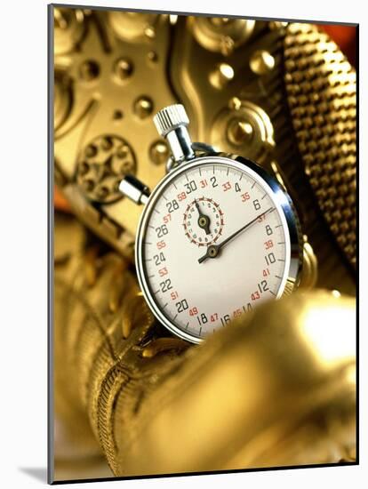 Stopwatch on Running Spikes-null-Mounted Photographic Print