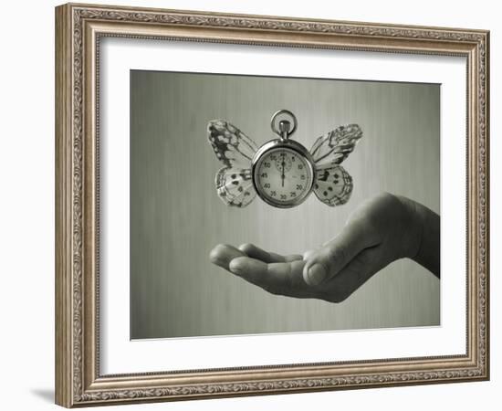 Stopwatch With Butterfly Wings Levitating Above Hand, Black And White, Slight Green Toning-foodbytes-Framed Art Print