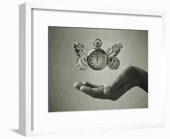 Stopwatch With Butterfly Wings Levitating Above Hand, Black And White, Slight Green Toning-foodbytes-Framed Art Print