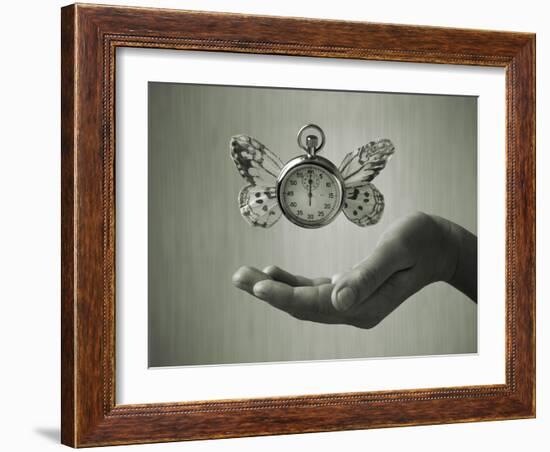 Stopwatch With Butterfly Wings Levitating Above Hand, Black And White, Slight Green Toning-foodbytes-Framed Art Print