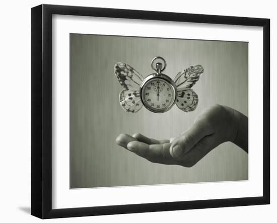 Stopwatch With Butterfly Wings Levitating Above Hand, Black And White, Slight Green Toning-foodbytes-Framed Art Print