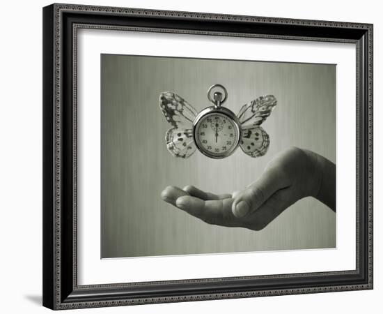 Stopwatch With Butterfly Wings Levitating Above Hand, Black And White, Slight Green Toning-foodbytes-Framed Art Print