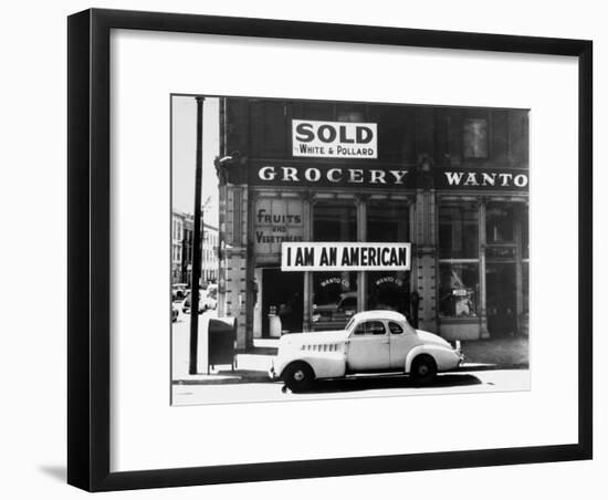 Store Sign Reads, "I am an American," After Pearl Harbor Attack, and "Sold", Following Evacuation-Dorothea Lange-Framed Photographic Print