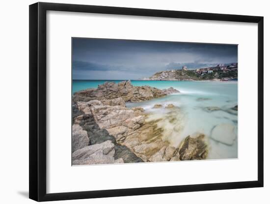 Storm clouds frame the village overlooking the turquoise sea, Santa Teresa di Gallura, Italy-Roberto Moiola-Framed Photographic Print