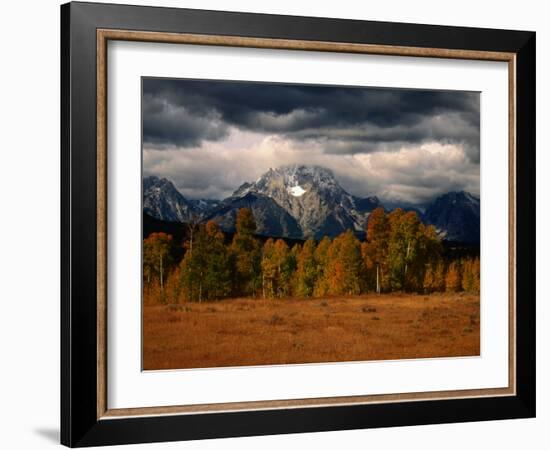 Storm Clouds Over Mountains and Trees, Grand Teton National Park, USA-Carol Polich-Framed Photographic Print