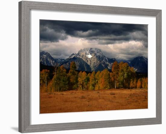 Storm Clouds Over Mountains and Trees, Grand Teton National Park, USA-Carol Polich-Framed Photographic Print