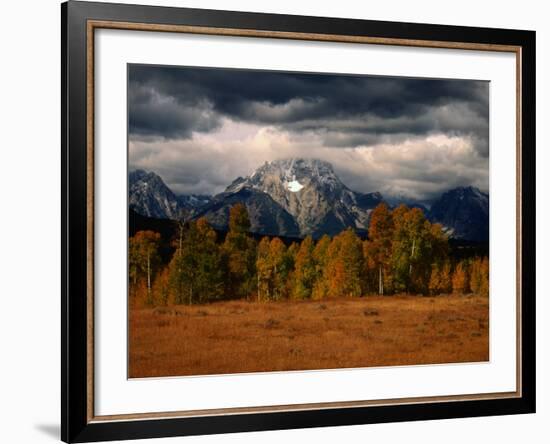 Storm Clouds Over Mountains and Trees, Grand Teton National Park, USA-Carol Polich-Framed Photographic Print