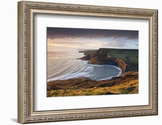 Storm Light Illuminates Chapmans Pool and Houns Tout Cliff, Viewed from St Aldhelm's Head, Dorset-Adam Burton-Framed Photographic Print