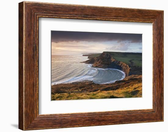 Storm Light Illuminates Chapmans Pool and Houns Tout Cliff, Viewed from St Aldhelm's Head, Dorset-Adam Burton-Framed Photographic Print