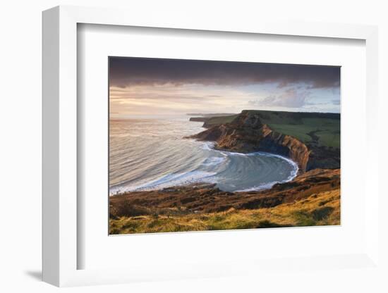 Storm Light Illuminates Chapmans Pool and Houns Tout Cliff, Viewed from St Aldhelm's Head, Dorset-Adam Burton-Framed Photographic Print