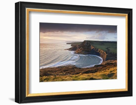 Storm Light Illuminates Chapmans Pool and Houns Tout Cliff, Viewed from St Aldhelm's Head, Dorset-Adam Burton-Framed Photographic Print