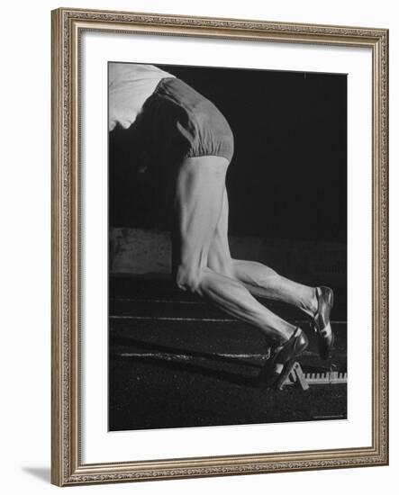 Straining Muscles Are Visible on Athlete Fanny Blankers Koen as She Starts from the Starting Blocks-Nat Farbman-Framed Premium Photographic Print