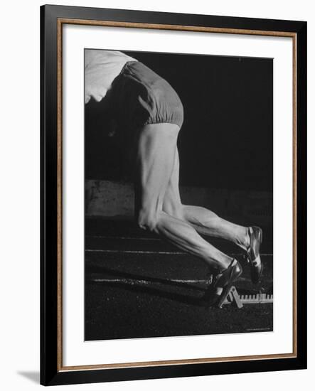 Straining Muscles Are Visible on Athlete Fanny Blankers Koen as She Starts from the Starting Blocks-Nat Farbman-Framed Premium Photographic Print