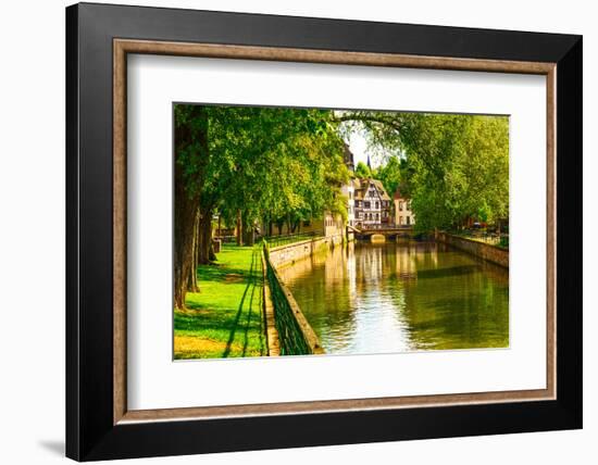 Strasbourg, Water Canal in Petite France Area. Half Timbered Houses and Trees in Grand Ile. Alsace,-stevanzz-Framed Photographic Print