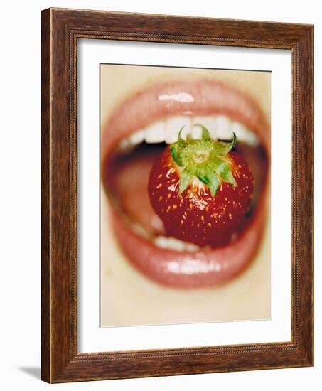 Strawberry Between Teeth-Cristina-Framed Photographic Print