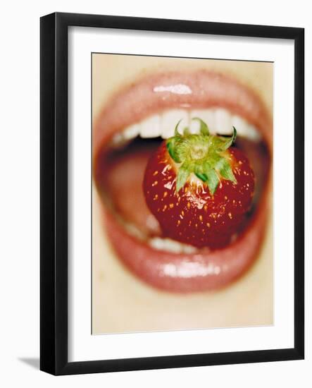 Strawberry Between Teeth-Cristina-Framed Photographic Print