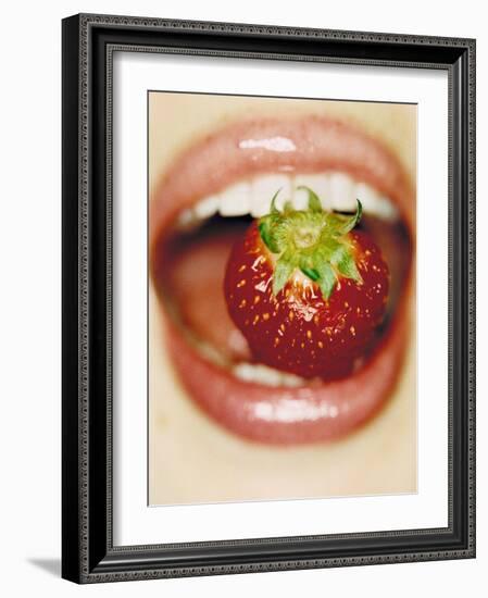 Strawberry Between Teeth-Cristina-Framed Photographic Print