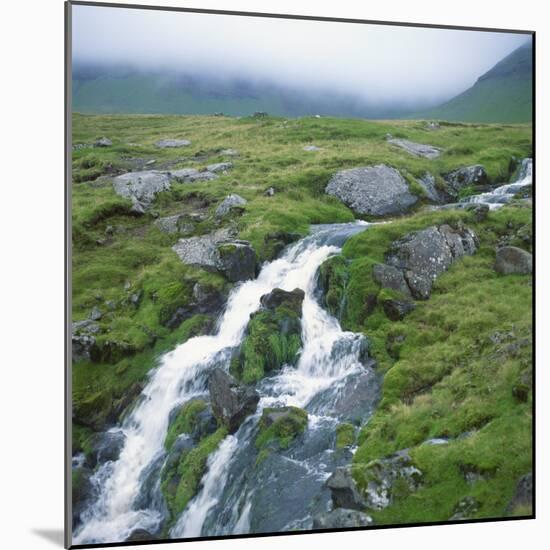 Stream Rushing over Rocks in a Wet Misty Environment, Estoroy Island, Faroe Islands, Denmark-David Lomax-Mounted Photographic Print