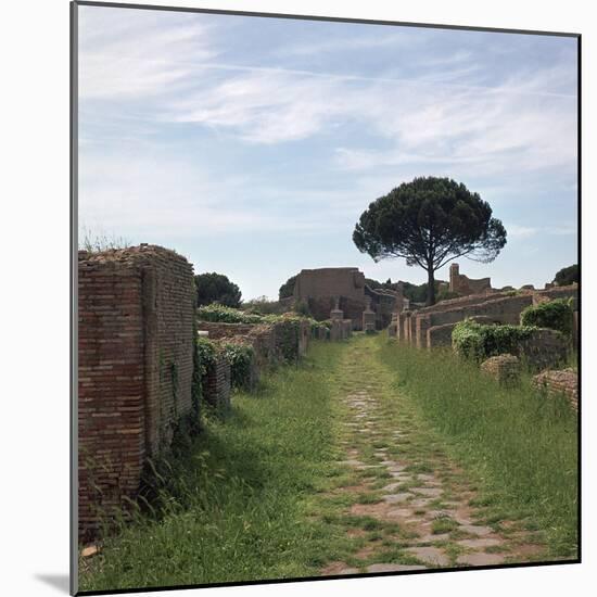 Street and Buildings in the Roman Town of Ostia, 2nd Century-CM Dixon-Mounted Photographic Print
