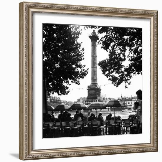 Street Cafe in the Rain, Colonne de Juillet, c1955-Paul Almasy-Framed Giclee Print