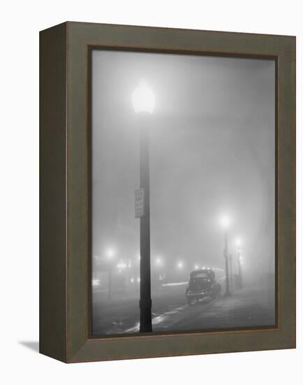 Street Lights Glow on a Foggy Night in New Bedford, Massachusetts, Jan, 1941-null-Framed Stretched Canvas
