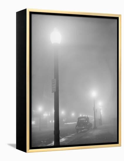 Street Lights Glow on a Foggy Night in New Bedford, Massachusetts, Jan, 1941-null-Framed Stretched Canvas