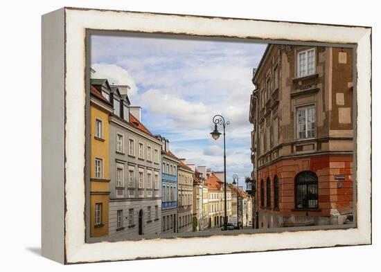 Street of homes is off the main square in Old Town Warsaw. Homes have been restored-Mallorie Ostrowitz-Framed Premier Image Canvas