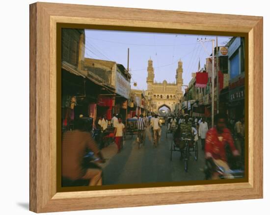 Street Scene with Bicycles and Rickshaw and the Char Minar Triumphal Arch Built in 1591, India-John Henry Claude Wilson-Framed Premier Image Canvas