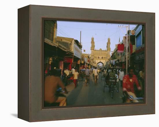 Street Scene with Bicycles and Rickshaw and the Char Minar Triumphal Arch Built in 1591, India-John Henry Claude Wilson-Framed Premier Image Canvas