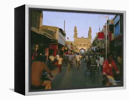 Street Scene with Bicycles and Rickshaw and the Char Minar Triumphal Arch Built in 1591, India-John Henry Claude Wilson-Framed Premier Image Canvas