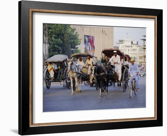 Street Scene with Horse Drawn Carriages, Rawalpindi, Punjab, Pakistan-David Poole-Framed Photographic Print