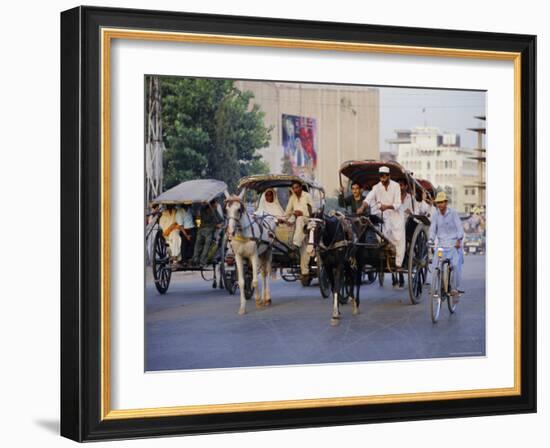 Street Scene with Horse Drawn Carriages, Rawalpindi, Punjab, Pakistan-David Poole-Framed Photographic Print