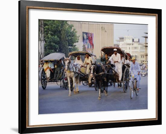 Street Scene with Horse Drawn Carriages, Rawalpindi, Punjab, Pakistan-David Poole-Framed Photographic Print