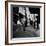 Street Scene with Village Atmosphere, Man Carrying Baby-Walker Evans-Framed Photographic Print