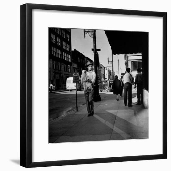 Street Scene with Village Atmosphere, Man Carrying Baby-Walker Evans-Framed Photographic Print