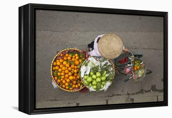 Street vendor with baskets of fruit on bicycle, Old Quarter, Hanoi, Vietnam-David Wall-Framed Premier Image Canvas