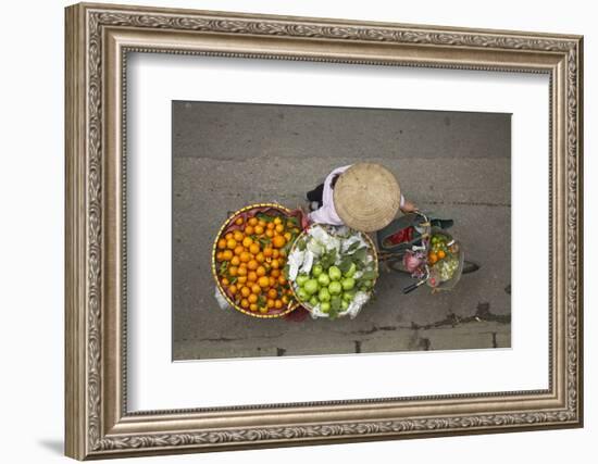 Street vendor with baskets of fruit on bicycle, Old Quarter, Hanoi, Vietnam-David Wall-Framed Photographic Print