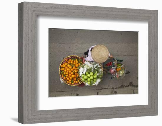 Street vendor with baskets of fruit on bicycle, Old Quarter, Hanoi, Vietnam-David Wall-Framed Photographic Print