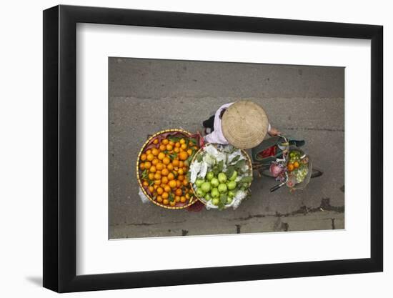 Street vendor with baskets of fruit on bicycle, Old Quarter, Hanoi, Vietnam-David Wall-Framed Photographic Print