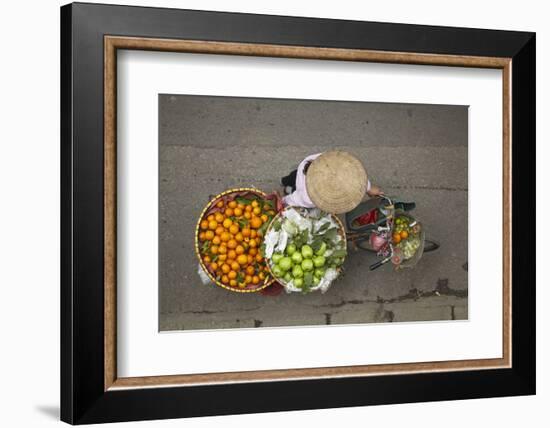 Street vendor with baskets of fruit on bicycle, Old Quarter, Hanoi, Vietnam-David Wall-Framed Photographic Print