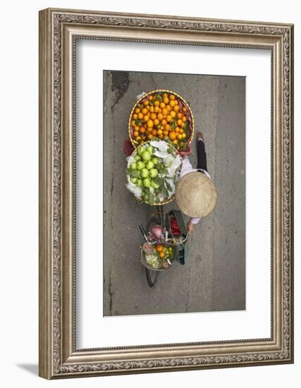 Street vendor with baskets of fruit on bicycle, Old Quarter, Hanoi, Vietnam-David Wall-Framed Photographic Print