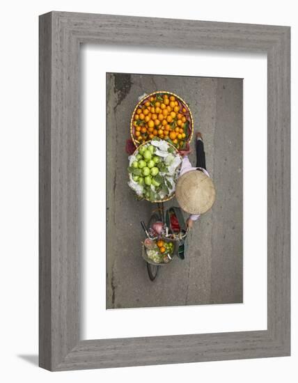 Street vendor with baskets of fruit on bicycle, Old Quarter, Hanoi, Vietnam-David Wall-Framed Photographic Print