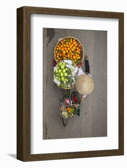 Street vendor with baskets of fruit on bicycle, Old Quarter, Hanoi, Vietnam-David Wall-Framed Photographic Print